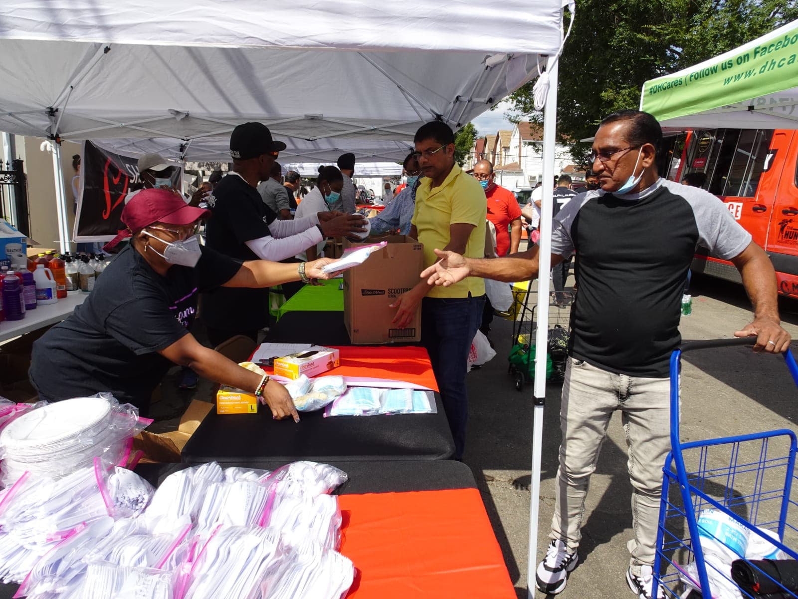 Volunteers distributing supplies at a community event